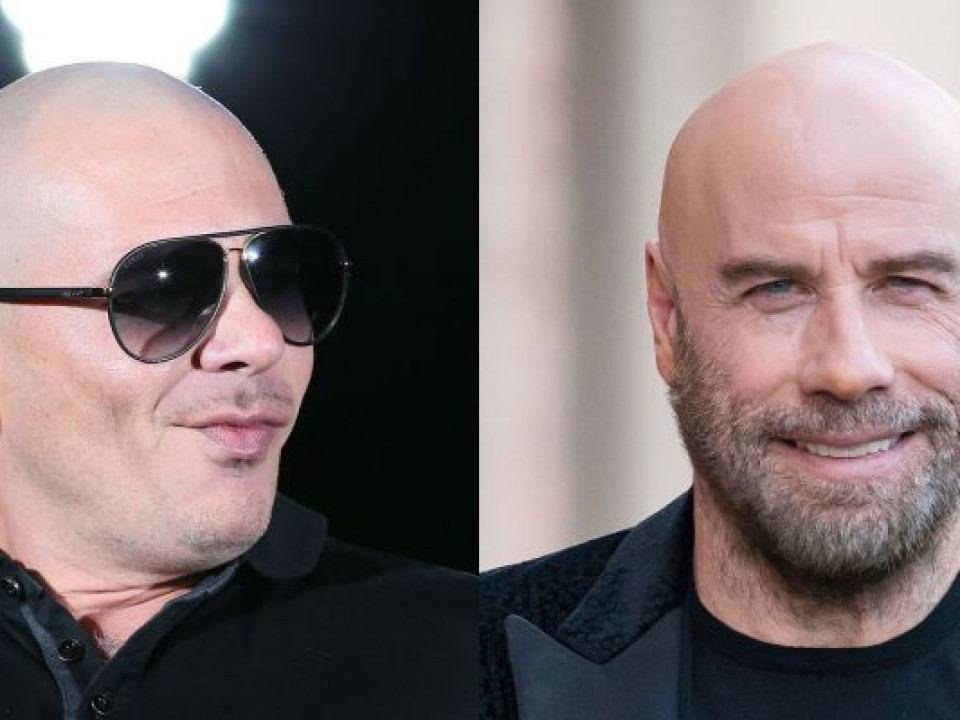 Ce îi leagă pe John Travolta și Pitbull? O prietenie strânsă și mai nou, tunsoarea.